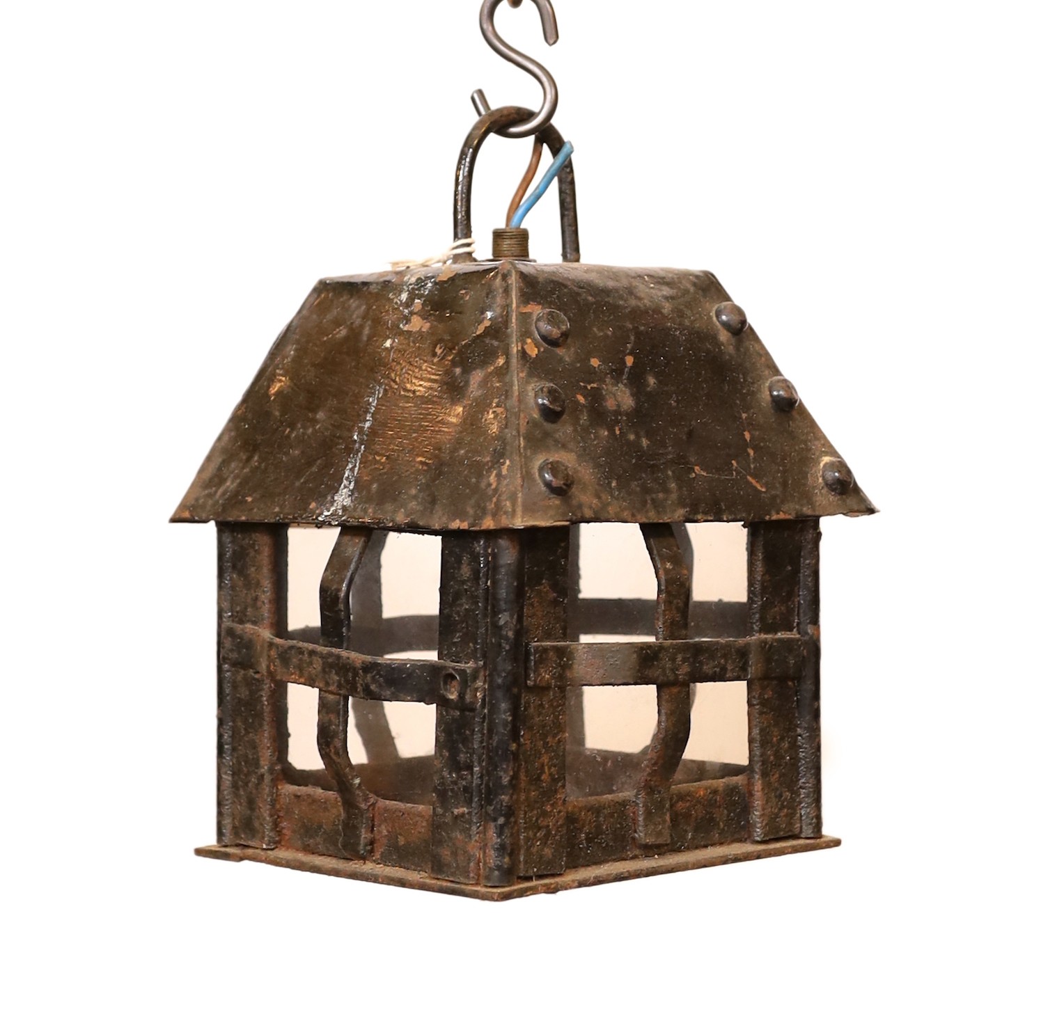 An early 20th century English wrought iron lantern with later clear glass panels, height 24cm. width 15cm